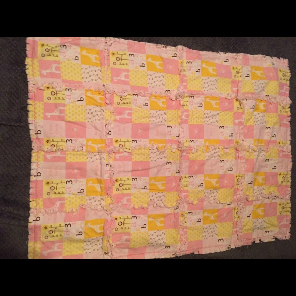 Pink flannel baby quilt / blanket.